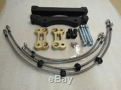 BMW 5 F10 brake caliper adapters to install F10 M5 brake system